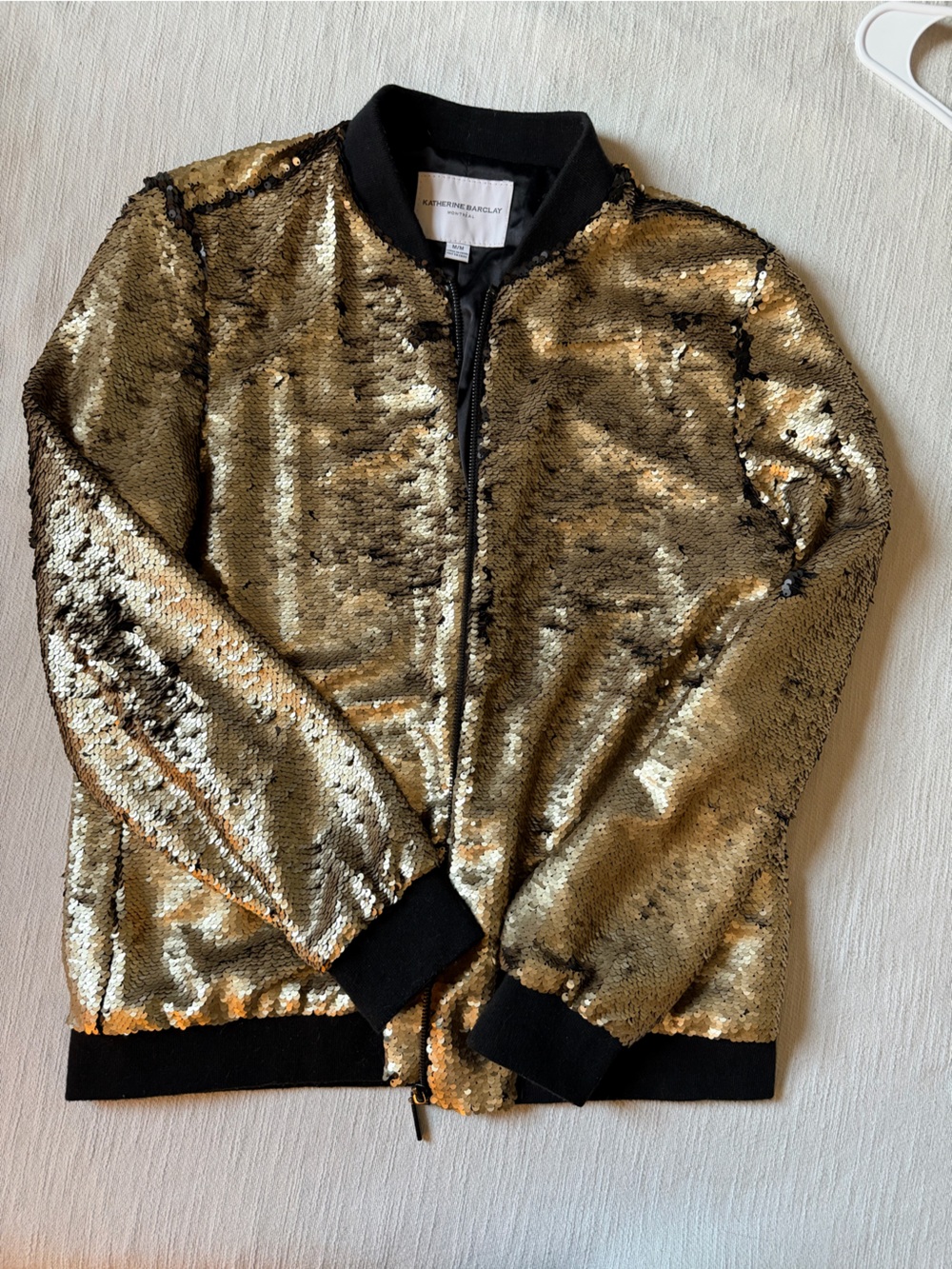 Katherine Barclay Gold/black Sequin bomber jacket with Black Waistband/sleeves